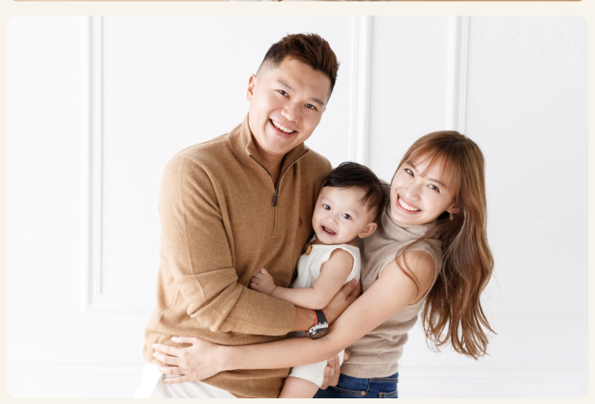 Professional family portrait photography session with happy family in Hong Kong studio